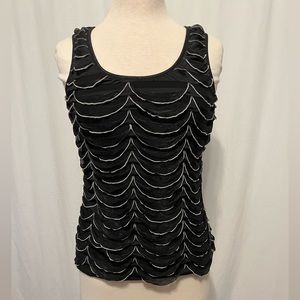 Unique drape trim pullover top.